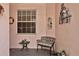 Inviting front porch with a bench and charming decor at 35 Enclave Dr, Winter Haven, FL 33884