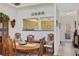 Bright dining room with a view into the kitchen at 35 Enclave Dr, Winter Haven, FL 33884