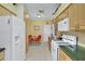Well-equipped kitchen featuring ample cabinetry and granite countertops at 35 Enclave Dr, Winter Haven, FL 33884