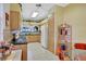 Modern kitchen with ample counter space and light wood cabinets at 35 Enclave Dr, Winter Haven, FL 33884