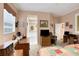Main bedroom features a desk and ensuite bathroom access at 35 Enclave Dr, Winter Haven, FL 33884
