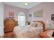 Cozy bedroom with a comfortable bed and ample closet space at 35 Enclave Dr, Winter Haven, FL 33884