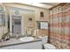 Clean bathroom with updated vanity and shower at 35 Enclave Dr, Winter Haven, FL 33884