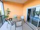 Spacious balcony with seating area, perfect for relaxing at 209 Andros Ave # 15301, Davenport, FL 33897