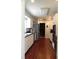 Long kitchen with ample cabinet space and stainless steel appliances at 2201 W Pilaklakaha Ave, Auburndale, FL 33823