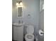 Clean bathroom with vanity, toilet, and medicine cabinet at 2201 W Pilaklakaha Ave, Auburndale, FL 33823