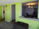 Open concept living room with pass-through to dining area at 2201 W Pilaklakaha Ave, Auburndale, FL 33823