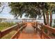 Wooden dock with gazebo, perfect for enjoying lake views at 3820 Traditions N Blvd, Winter Haven, FL 33884