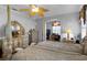 Main bedroom with ensuite access, large bed, and walk-in closet at 3820 Traditions N Blvd, Winter Haven, FL 33884