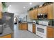 Modern kitchen with stainless steel appliances and ample cabinetry at 3820 Traditions N Blvd, Winter Haven, FL 33884