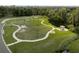 Community dog park with walking paths and shaded areas at 3820 Traditions N Blvd, Winter Haven, FL 33884
