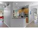 Open kitchen with breakfast bar and stainless steel appliances at 3820 Traditions N Blvd, Winter Haven, FL 33884