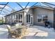 Spacious patio with seating area and grill, ideal for outdoor entertaining at 3820 Traditions N Blvd, Winter Haven, FL 33884