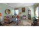 Light-filled living room with a sofa and decorative accents at 3820 Traditions N Blvd, Winter Haven, FL 33884