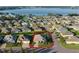 Aerial view of house and surrounding neighborhood, close to lake at 3820 Traditions N Blvd, Winter Haven, FL 33884