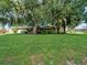 Ranch home with large yard and mature trees at 126 Bermuda Ct, Winter Haven, FL 33880