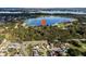 Birds-eye view of the property's location near the lake and neighborhood at 126 Bermuda Ct, Winter Haven, FL 33880