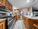 Kitchen features stainless steel appliances and wood cabinets at 126 Bermuda Ct, Winter Haven, FL 33880