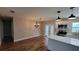 Bright dining room with hardwood floors and access to the backyard at 210 Lake Thomas Dr, Winter Haven, FL 33880