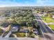 Property's aerial view showing location and neighborhood at 2221 W Pilaklakaha Ave, Auburndale, FL 33823