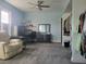 Bedroom with a desk, recliner, and closet at 2418 W 1St St, Sanford, FL 32771