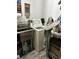 Laundry room boasts a utility sink and ample storage at 2418 W 1St St, Sanford, FL 32771