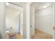Bathroom with toilet, shower, and walk-in closet at 4189 Cannes Ave, Lake Wales, FL 33859