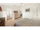 Bedroom with neutral decor and access to bathroom at 4189 Cannes Ave, Lake Wales, FL 33859