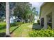 Landscaped backyard with patio and lush greenery at 4189 Cannes Ave, Lake Wales, FL 33859