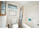 Bathroom with toilet, bathtub, and shower at 4189 Cannes Ave, Lake Wales, FL 33859