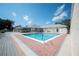 Inviting community pool with a spacious deck at 4189 Cannes Ave, Lake Wales, FL 33859