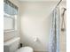 Small bathroom with toilet and shower at 4189 Cannes Ave, Lake Wales, FL 33859
