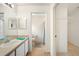 Clean bathroom with single sink vanity and shower/tub combo at 4189 Cannes Ave, Lake Wales, FL 33859