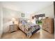 Bedroom with a queen-size bed and nightstands at 4189 Cannes Ave, Lake Wales, FL 33859