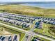 Wide aerial view showcasing the house and neighborhood at 112 Sofia Ln, Lake Alfred, FL 33850