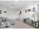 Spacious loft area with comfortable seating and built-in shelving at 112 Sofia Ln, Lake Alfred, FL 33850