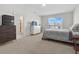 Spacious main bedroom with large bed and plenty of closet space at 112 Sofia Ln, Lake Alfred, FL 33850