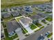 Aerial view of a two-story house in a residential neighborhood at 112 Sofia Ln, Lake Alfred, FL 33850