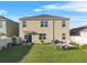 Large backyard with patio and grassy area, perfect for outdoor entertaining at 112 Sofia Ln, Lake Alfred, FL 33850