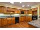Well-equipped kitchen boasting ample cabinetry and granite countertops at 109 Odin Dr, Winter Haven, FL 33884