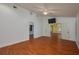 Large bedroom with hardwood floors and access to a private bathroom at 109 Odin Dr, Winter Haven, FL 33884