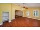 Open living area with hardwood floors and built-in shelving at 109 Odin Dr, Winter Haven, FL 33884