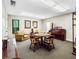 Community room with seating, piano, and bookshelves at 109 Odin Dr, Winter Haven, FL 33884