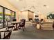 Community room with fireplace, seating area, and dining table at 109 Odin Dr, Winter Haven, FL 33884