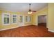 Bright sunroom with hardwood floors and white doors at 109 Odin Dr, Winter Haven, FL 33884