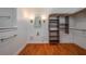 Large bathroom with walk-in closet and wood flooring at 109 Odin Dr, Winter Haven, FL 33884