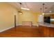 Dining room with hardwood floors and a kitchen view at 109 Odin Dr, Winter Haven, FL 33884
