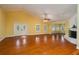 Spacious living room with hardwood floors and a fireplace at 109 Odin Dr, Winter Haven, FL 33884