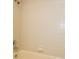 Beige tiled shower and bathtub in bathroom at 1012 Medinah Dr, Winter Haven, FL 33884