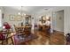 Formal dining room with hardwood floors and chandelier at 466 Muirfield Ct, Winter Haven, FL 33884